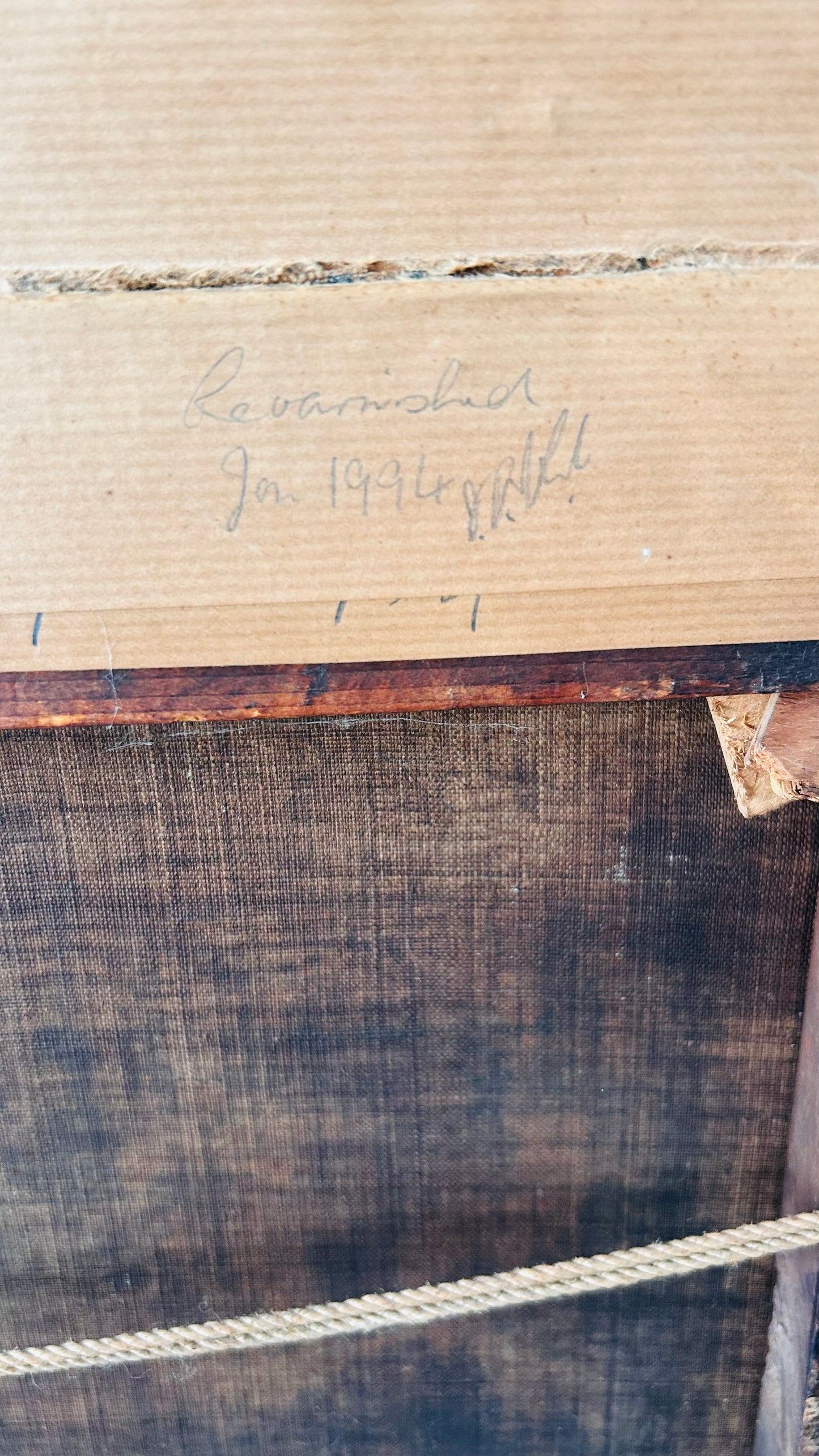 Note and date of revarnish on antique oil painting verso