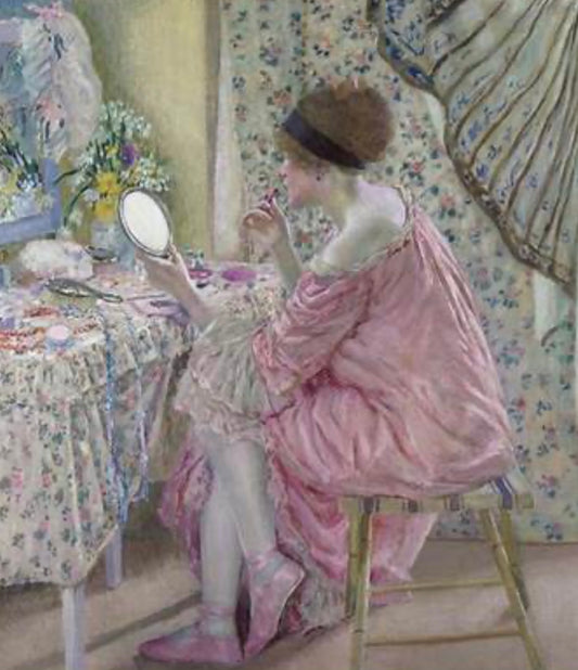 American Vintage Pink Ballet Prep Impressionist Wall Art Print  Originally created in the &nbsp;early 20th Century this enchanting print from an original impressionist artwork by Carl Frieseke &nbsp;combines the essence of the era. The lady looks contemplatively into her hand held mirror. &nbsp;She is wearing a silk pink dress with matching ballet shoes seated at her dressing table. &nbsp;The subtle pink purple tones and muted colour palette will endow any room with a sense of calmness and tranquillity.