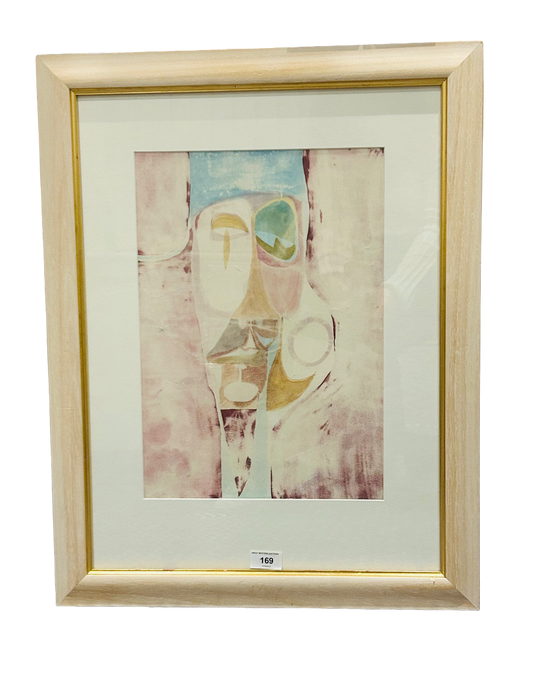Framed abstract artwork by Tom Murdoch titled “Graven Image” (1969), featuring pastel tones and stylized facial forms in mixed media.