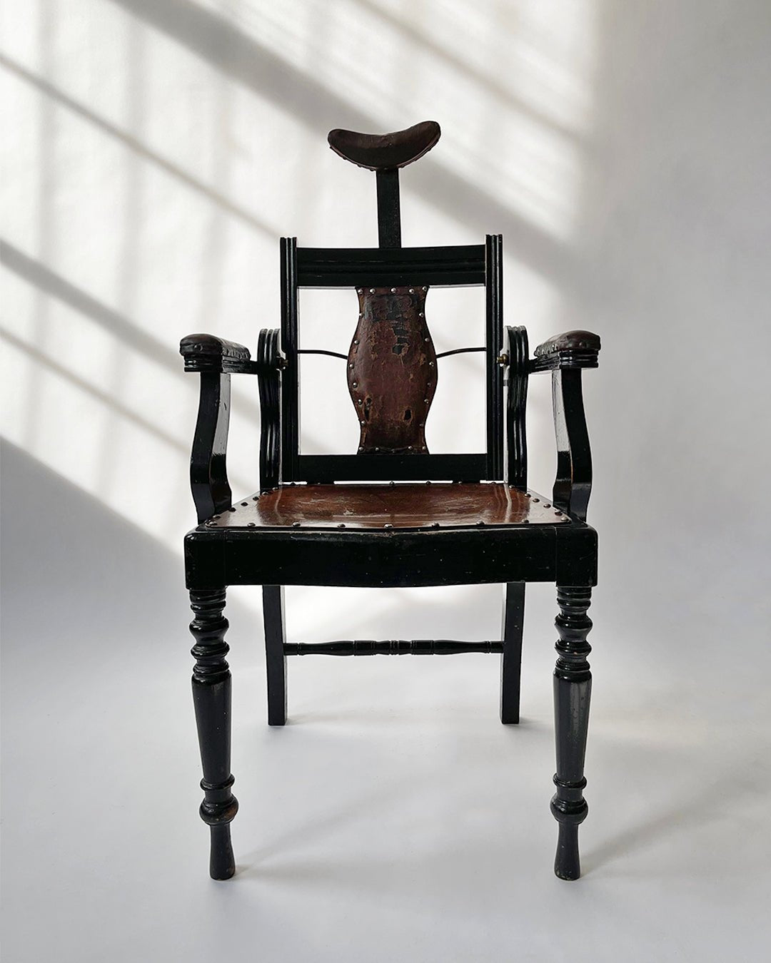Antique Barber Chair. - Room Four